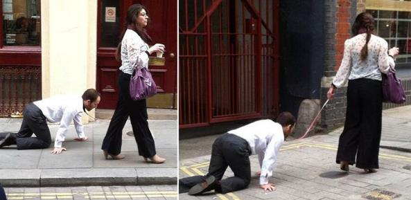 倫敦街頭驚現(xiàn)女子牽狗繩“遛男人”